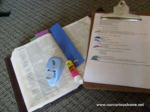 Bible, decorative punch, glue stick, bookmarks, lesson outline