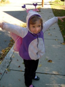 K wearing her butterfly wings - because she usually does