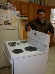 Nestor installing the new stove
