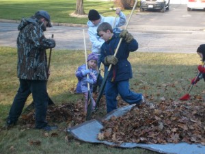 M and cousin raking