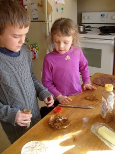 M teaching K how to make cinnamon toast