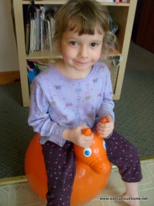 K on her bouncy pony