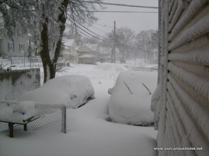 The cars and driveway at our house Saturday covered in 18 inches of snow from Nemo