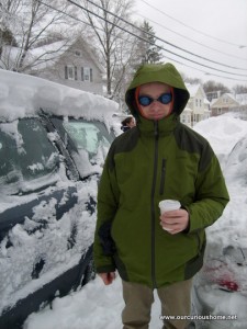 Ben in swim goggles against the snow in the wind