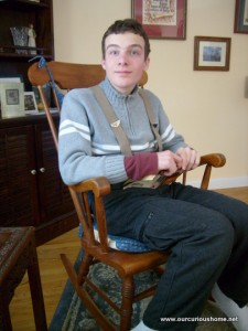 B relaxing on the rocking chair at Grandma's house