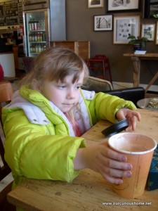 K with her cocoa cup