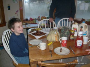 M smiling at his bacon