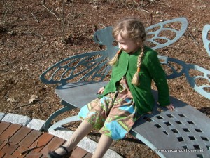 K resting on the dragonfly bench