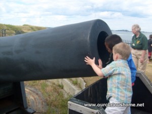 peeking into a cannon at Castle Island