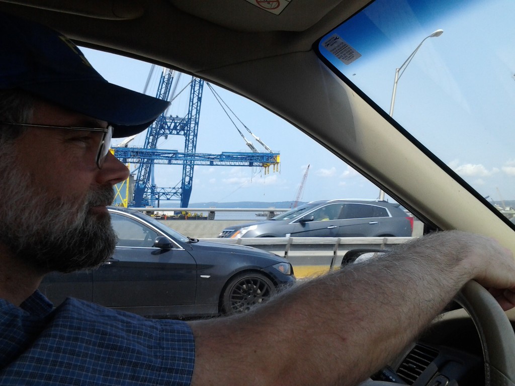 Dan driving home over the Tappan Zee Brige with new bridge in the background