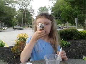 K biting her ice cream cone