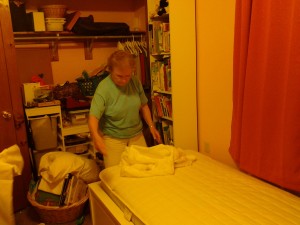 Mommom organizing the bed