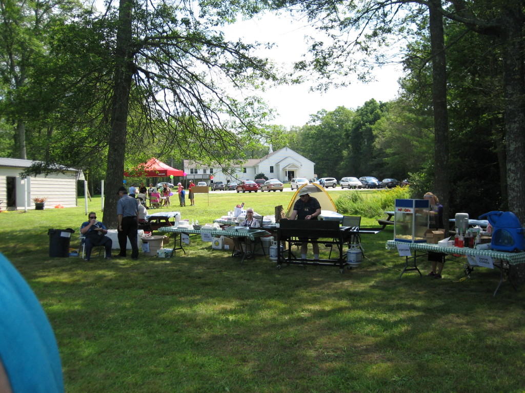 Bob manning the food tables 