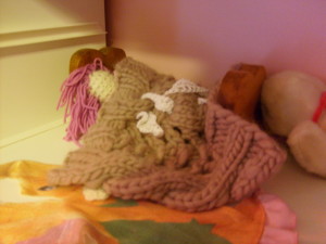 K's crocheted mermaid in bed