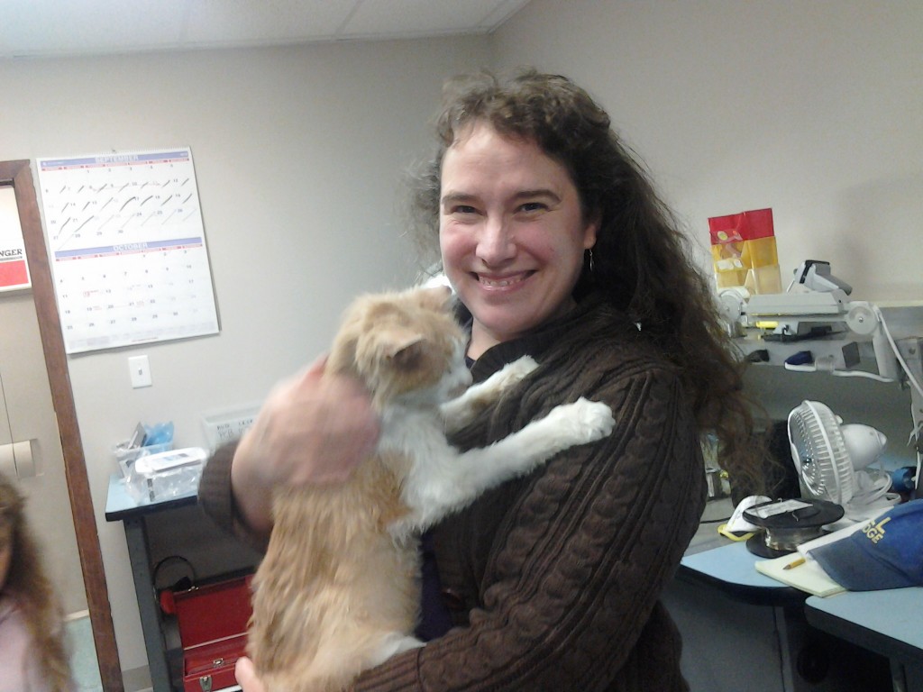 Christine holding George the Cat at Dan's office