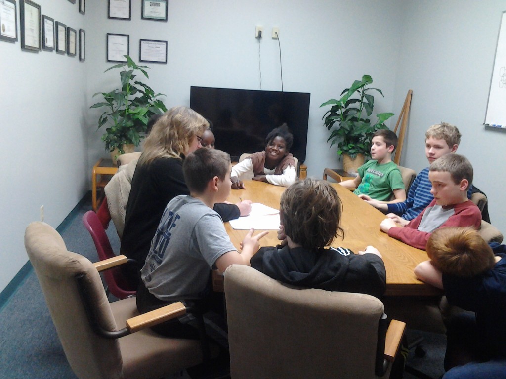 M's team in the conference room at Dan's Lab