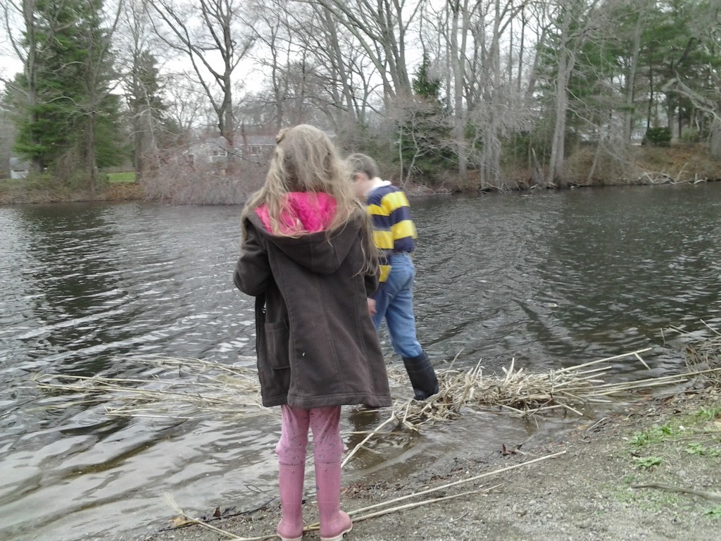 M steps on the raft to see how it floats.