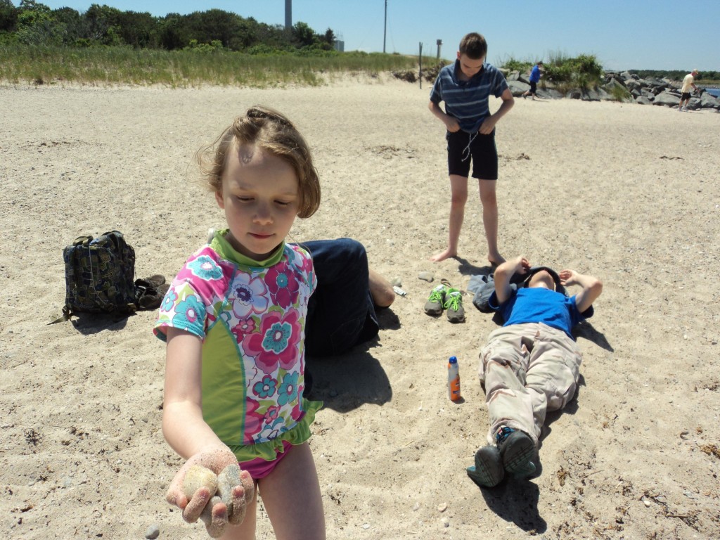 K showing off her pretty rocks and shells