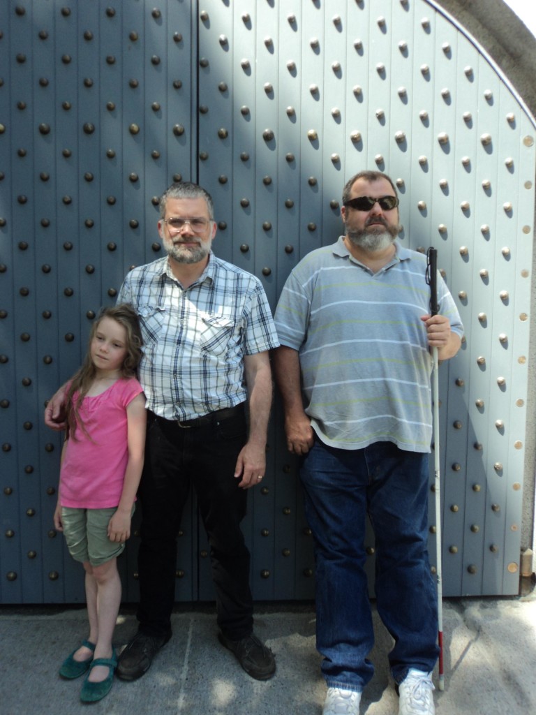 K, Dan and Warren in front of an impressive door at Castle Island