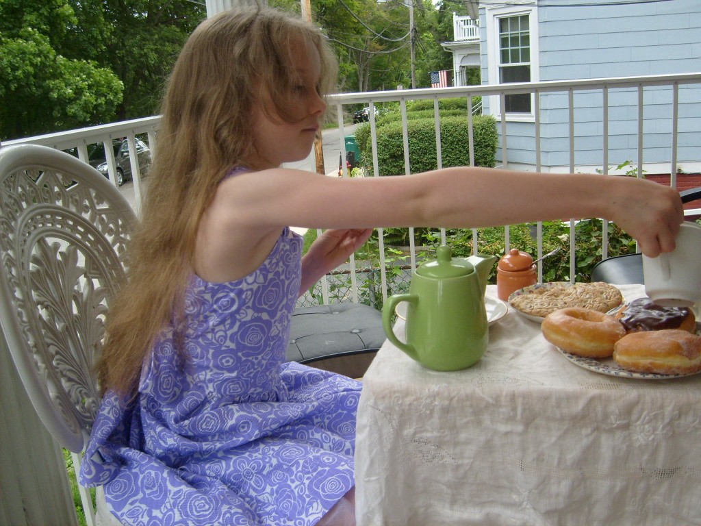 The Princess adds milk to his Rooibos