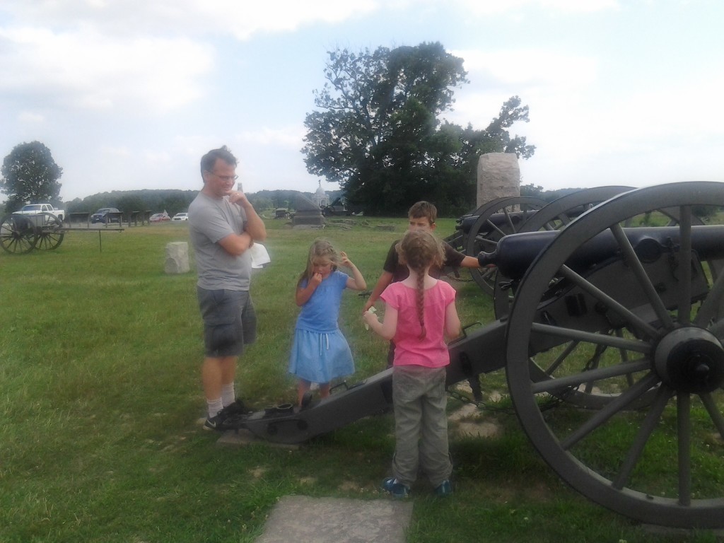 Jon and his kids with K at a cannon