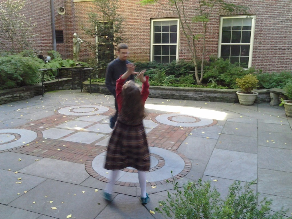 K dancing in the art museum garden