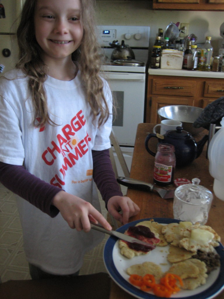 K making breakfast out of fresh tortillas