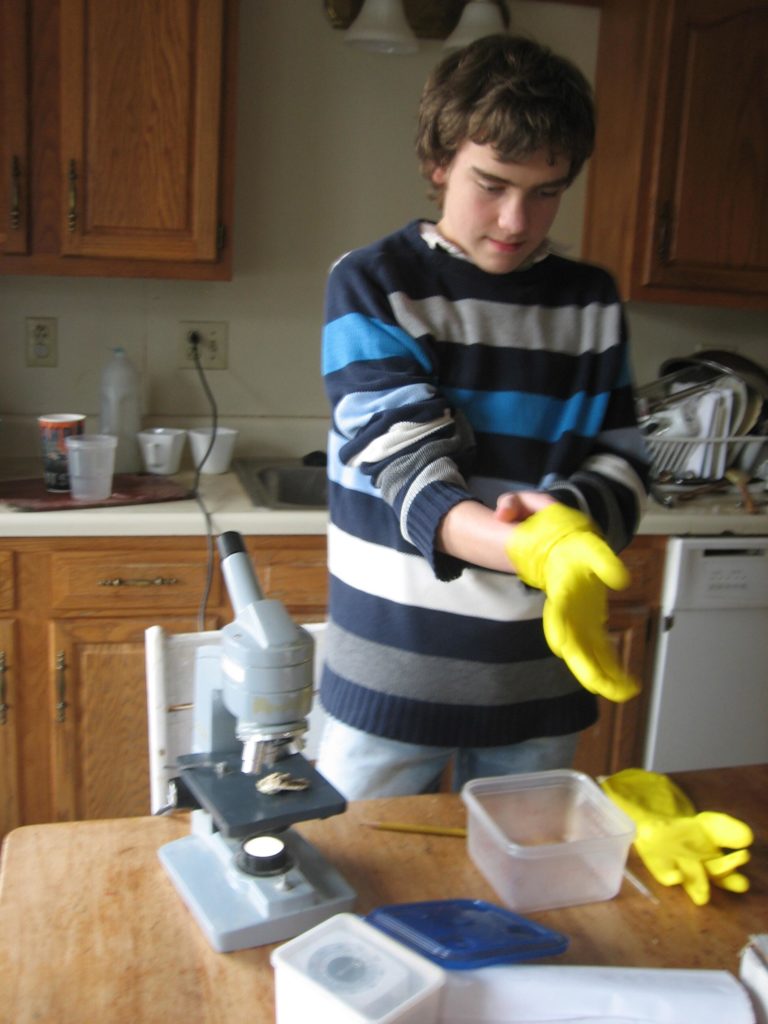 M adjusting the yellow dish washing gloves