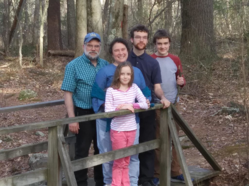 Dan, Me, Ben, Matt and K standing on the foot bridge at Caratunck - we are under orders to get a family photo for Mom-Mom
