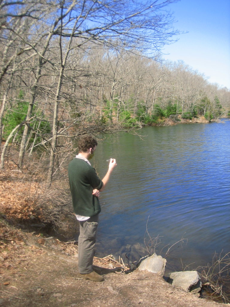 Ben standing in cove of reservoir