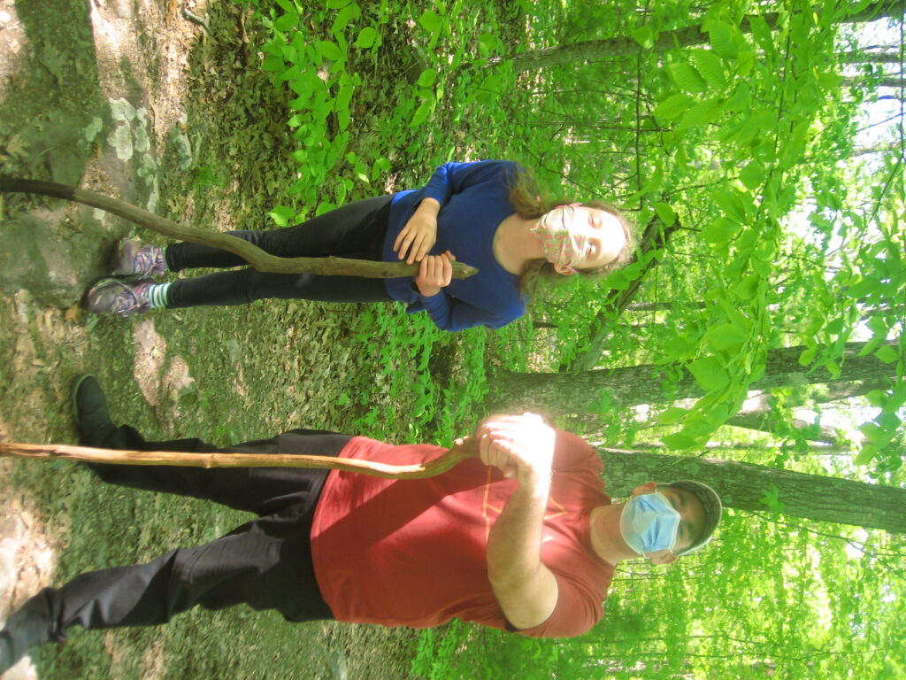 K and Kevin in face masks with walking sticks