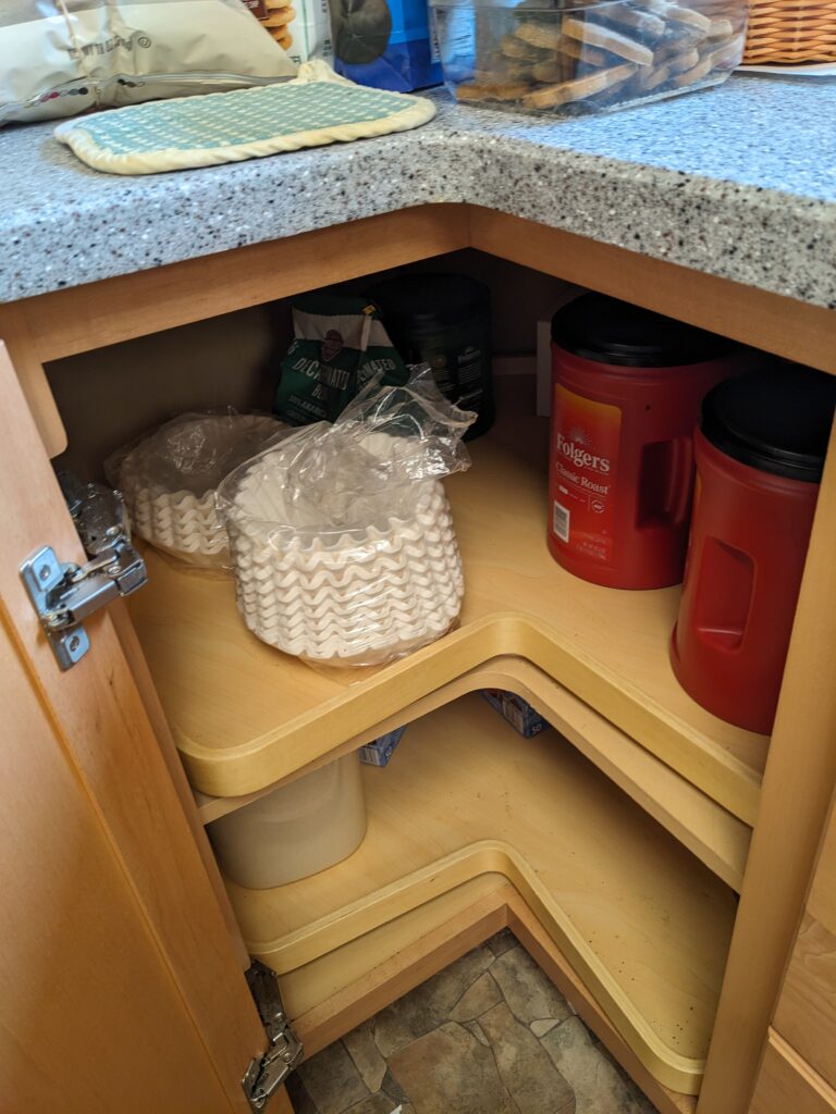 where is the coffee kept? open cupboard